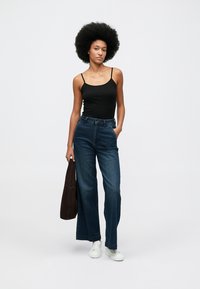 TOM TAILOR MADINA - Calças de ganga de corte relaxado - clean mid stone blue denim