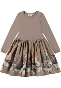 Vestido de manga larga con parte superior beige y falda acampanada que presenta un estampado de conejos y acentos florales en el dobladillo. Mezcla de algodón suave y texturizado.