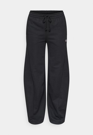 Black sweatpants made of cotton blend, featuring an elastic waistband with drawstring, wide legs, and side pockets. Small logo detail included.