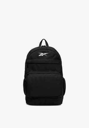 Mochila negra de Reebok con asa superior, bolsillo delantero con cremallera y logo blanco de Reebok en el panel frontal superior.