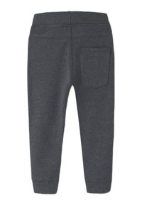 Dunkelgraue Sweatpants aus weichem Stoff, mit elastischem Bund und einer einzelnen Gesäßtasche mit abgerundeter Kante.