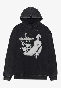 Mustat hupparit, joissa on etuosassa graafinen printti tyylitellyistä kasvoista. Kulunut kangas, rento malli sekä resorit helmassa ja hihoissa.