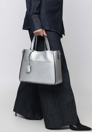 Silver handbag featuring a textured leather finish, rectangular shape, dual top handles, and a matching detachable tag.
