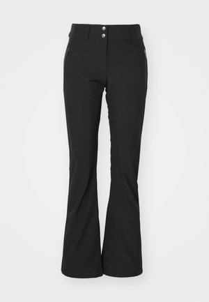 Pantaloni neri a gamba larga realizzati in tessuto morbido e elasticizzato. Presentano un alto punto vita, due tasche frontali con zip e dettagli con bottoni argentati.