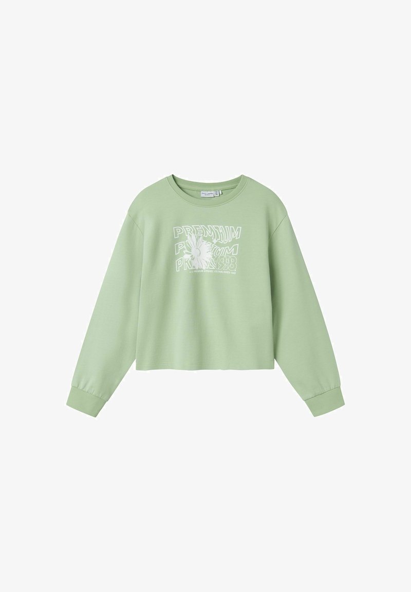 Sudadera corta verde claro con mangas largas, cuello redondo y texto gráfico en el frente con diseño floral en blanco. Material suave de mezcla de algodón.