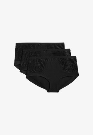 Ensemble de trois culottes noires avec des accents en dentelle sur la ceinture, une texture à pois et une finition lisse. Un détail en forme de nœud sur chaque pièce.