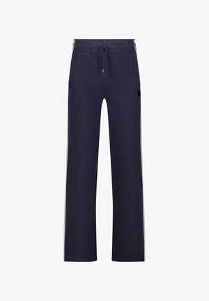 Pantalon de jogging bleu marine en tissu doux avec une coupe décontractée, doté de deux poches latérales et de bandes blanches sur les côtés pour le contraste. Taille à cordon de serrage.