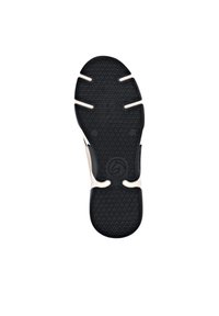 Semelle de chaussure en caoutchouc noir avec un motif texturé, forme arrondie et talon renforcé. Elle présente un accent contrastant plus clair sur le bord.