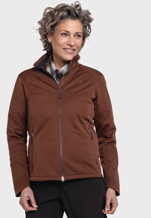 Brown softshell jacket with a high collar, zippered front, and two side pockets. The fabric is smooth with a slight sheen; features logo detail.