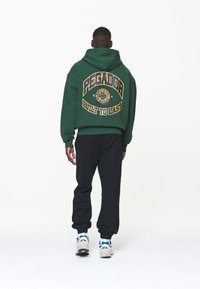 Pegador Sudadera con cremallera - green