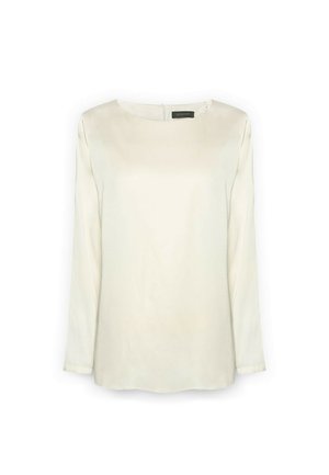 Langarmige crème blouse met een ronde halslijn, gemaakt van zachte stof, met een subtiele glans en een sleutelgat sluiting aan de achterkant.