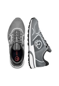 Gray athletic shoes with a textured upper, white accents, logo on the side, and a patterned sole. Features a padded collar and laces.
