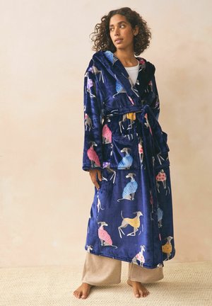 Navyblauwe, zachte badjas met veelkleurige hondenpatronen, strikbaar in de taille met een riem. Inclusief twee voorzakken. Zachte textuur.