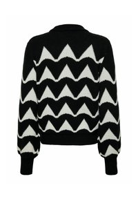 Maglione lavorato a maglia in bianco e nero con motivo a zigzag, colletto rotondo e polsini e orlo a coste. Texture morbida con una vestibilità rilassata.