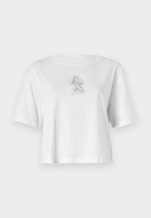 T-shirt bianca in cotone con una vestibilità ampia, maniche corte, collo rotondo e un design grafico che presenta "AX" in argento con un motivo a pois.