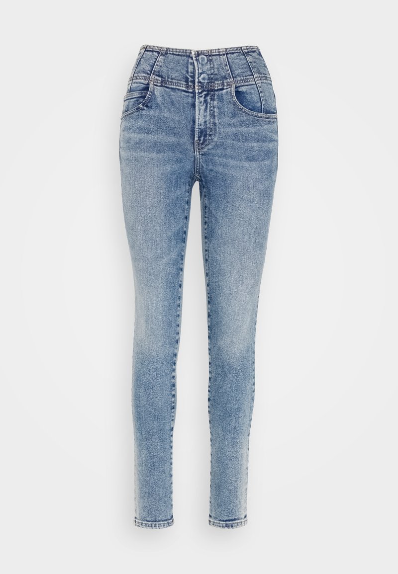 Jeans in denim leggeri, a vita alta e slim-fit, con cinque tasche, cuciture a contrasto e una finitura leggermente sbiadita.