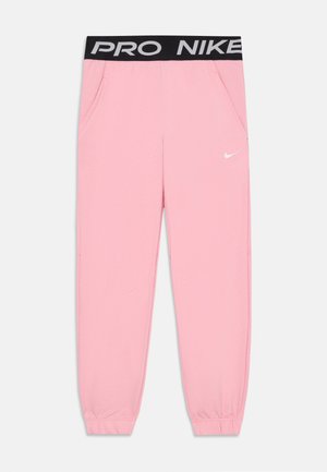 Pantalons de sport roses avec une taille élastique portant "PRO NIKE" en noir. Ils ont des poches latérales et des jambes fuselées avec des poignets élastiques.