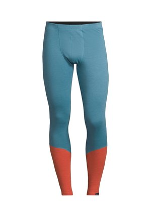 Blå termoleggings med en orange nederste sektion. Har en glat tekstur, elastisk talje og forstærkede sømme for holdbarhed.