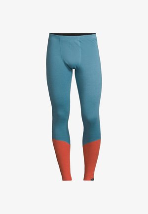 Blå termoleggings med en orange nederste sektion. Har en glat tekstur, elastisk talje og forstærkede sømme for holdbarhed.