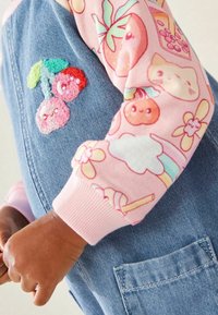 Next Farkkumekko - pink