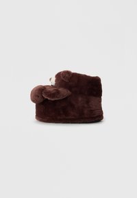 Brown plush bear-shaped slipper with rounded shape, soft texture, and ear accents. Features a fabric sole for indoor use.