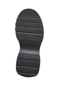 Semelle de chaussure noire avec des parties antidérapantes texturées et des rainures horizontales, taille marquée 38 au centre.