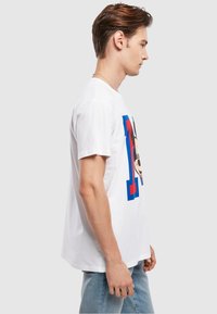 Merchcode MICKEY MOUSE M FACE - T-shirts med print - white