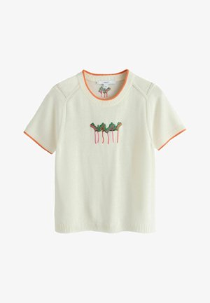 White short-sleeve sweater with orange trim and embroidered green and pink leaves on the chest and inside neckline.