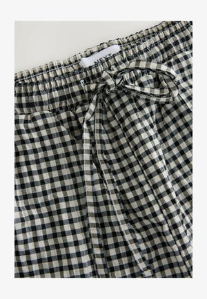 Black and white gingham-patterned shorts with an elastic waistband and front tie detail. Material is lightweight and woven.