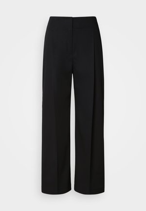 Melnas augstas jostasvietas plašas bikšu kājas ar slēptu priekšējo aizdari, šūtiem vīlēm un gludu, strukturētu audumu.