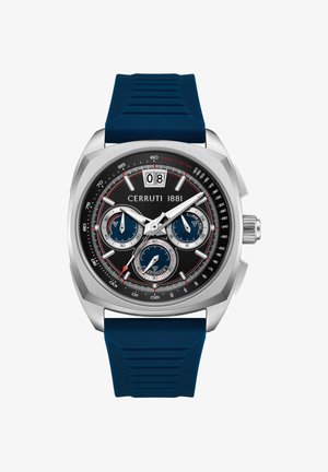 Cerruti 1881 pulksteņa korpusā ir nerūsējošais metāls, melnas krāsas ciparnīca, zila gumijas josta, trīs mazās ciparnīcas un sarkanie akcenti. Datums tiek rādīts 12:00.