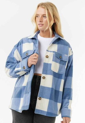 Fleece shirt jacket met een blauw-witte ruitpatroon. Bevat een kraag, voorknopen en twee borstzakken met ronde kleppen.