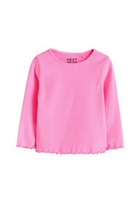 Lyserød langærmet top med ribbet tekstur og bølget kant. Rund halsudskæring og synligt mærke indeni kraven. Glat materiale, velegnet til lag-på-lag påklædning.