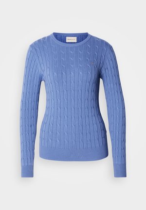 Blue cable-knit sweater featuring a round neckline and ribbed cuffs. Made from soft material with subtle branding detail on the chest.