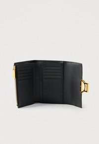 Black leather trifold wallet with six card slots, a zippered coin pocket, and a gold-tone clasp closure on a light background.