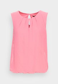 Top senza maniche di un rosa chiaro, con scollatura rotonda e dettaglio a forma di chiave sul retro, e delicate pieghe sul davanti. Texture liscia.