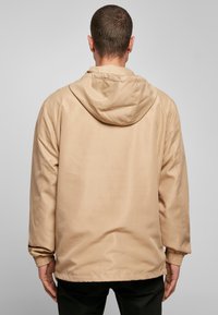 Urban Classics Vjetrovka - unionbeige