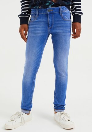 RELAXED FIT - Vaqueros slim fit - light blue