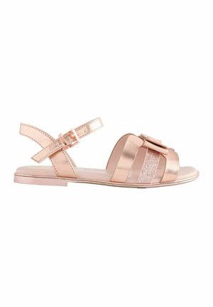 Rosenfarvede sandaler med flad sål, der har en metallisk finish, dekorativ sløjfe og glitrende detaljer på de øverste stropper. Justerbar spænde-lukning.