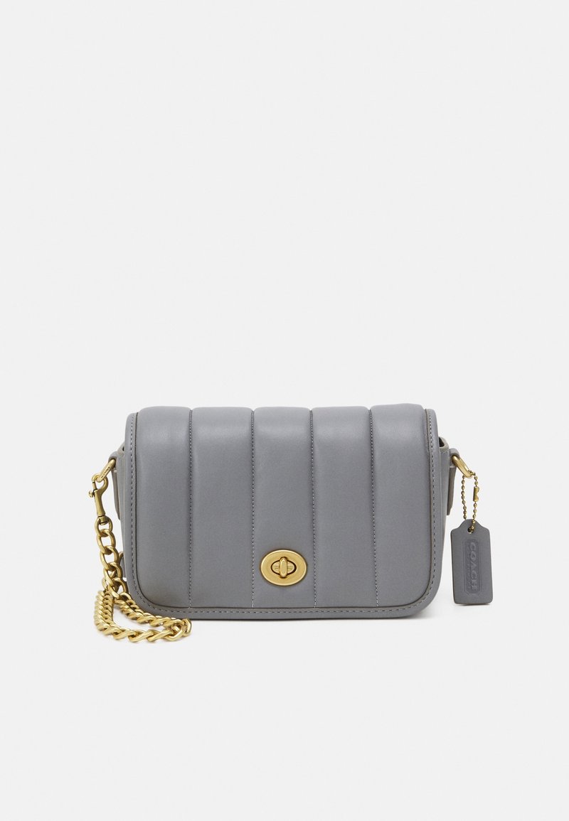 Gray leather crossbody bag with quilted design, gold-tone hardware, and chain strap. Features a logo clasp and a hang tag.