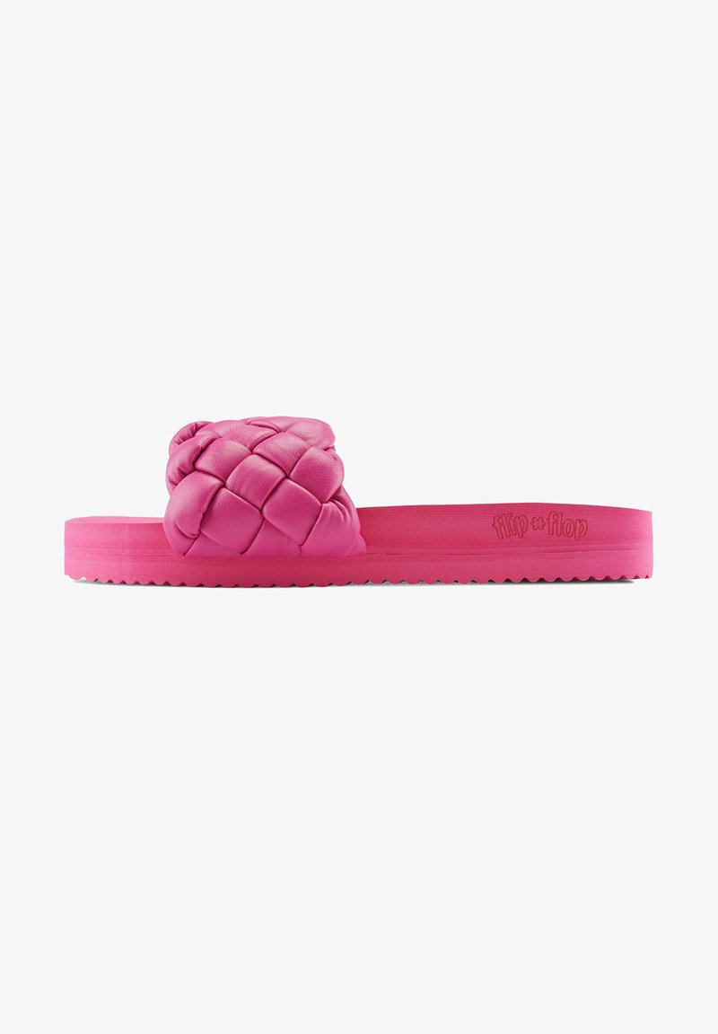 Pink slide sandal with a braided upper design, flat sole, and textured rubber outsole. Features a wide strap for comfort.