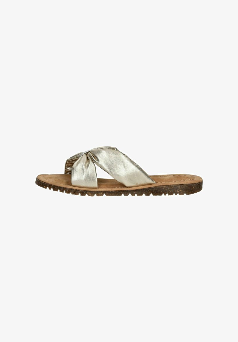 Metallic silver flat sandals with a knotted textile strap, cork footbed, and textured rubber outsole for grip.
