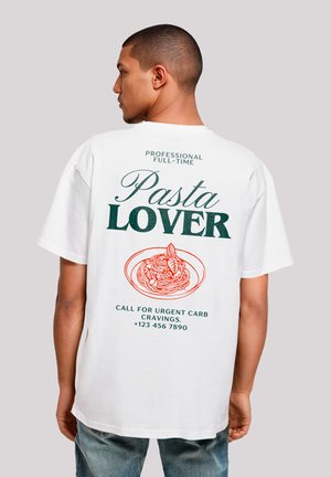 White short-sleeve t-shirt featuring green and red printed text and a graphic of pasta on the back. Casual fit, cotton material.