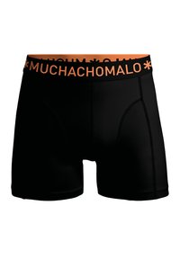 Fekete boxeralsó elasztikus derékkal, narancssárga "MUCHACHO MALO" logóval, sima textúrával és testhez simuló kialakítással.