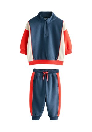 Sweatshirt- und Jogginghosen-Set in Marineblau, mit roten und cremefarbenen Farbblöcken, einem Halb-Zip-Kragen und einem elastischen Bund mit Kordelzug.