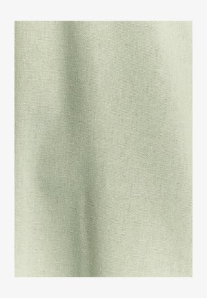 Lys grøn, tekstureret stof med et fint vævemønster, der viser svage folder og rynker for et blødt udseende. Velegnet til beklædning eller polstring.