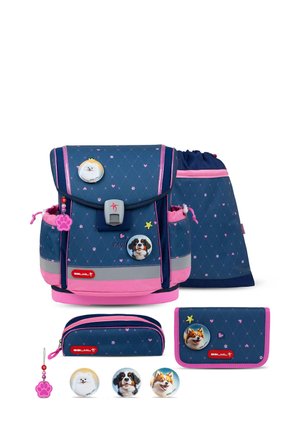 Backpack set featuring a blue and pink design, geometric patterns, dog images, a front flap with clasp, and additional accessories including a pencil case and drawstring bag.