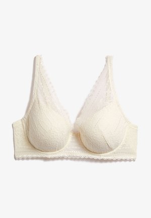 Cremefarbener Spitzen-BH mit Unterwäsche, breiten Spitzen-Trägern und gezackten Kanten, entworfen für Halt und dekorative Wirkung.
