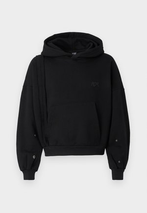 Black cropped hoodie with a drawstring hood, front pocket, and unique side detailing. Features ribbed cuffs and buttons at the sleeves.