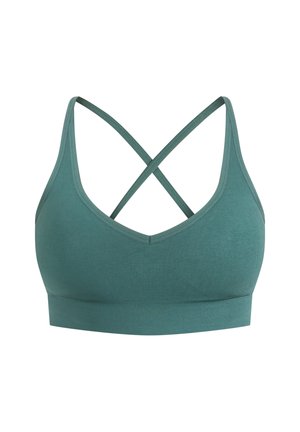 Naadloze sportbh in gedimd groen. Kenmerkt een V-hals, brede onderband en gekruiste bandjes op de rug. Zachte, rekbare stof.